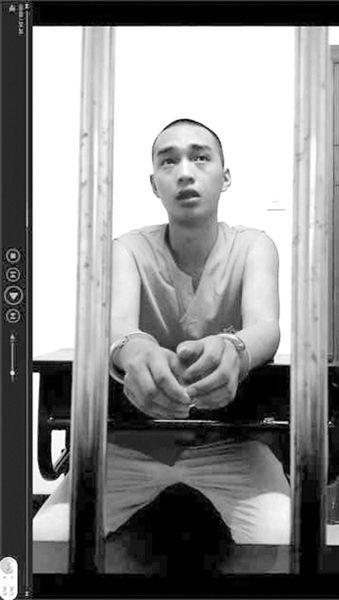 在看守所里的陳明燦。視頻截圖