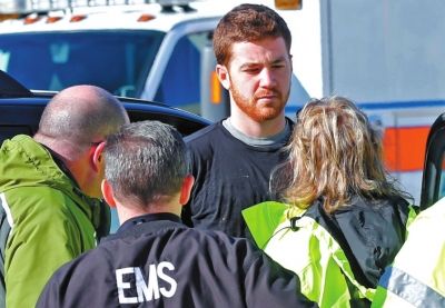 嫌犯接受詢問(wèn)。新華社/美聯(lián)