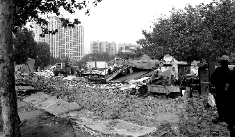 對公園選址的5.5萬多平方米的違章建筑進行拆除。