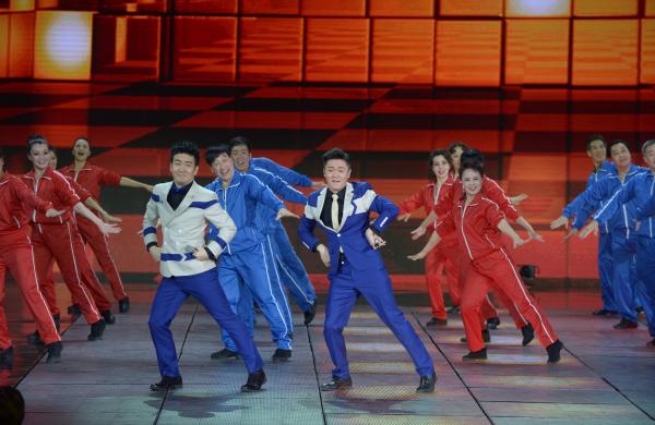 《小蘋果》、《最炫民族風(fēng)》等廣場舞曲將會有全國統(tǒng)一、編排科學(xué)、帶給人正能量的全新動作。 CFP 資料