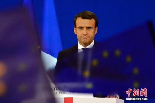 圖為馬克龍?jiān)趹c祝集會上。中新社記者 龍劍武 攝